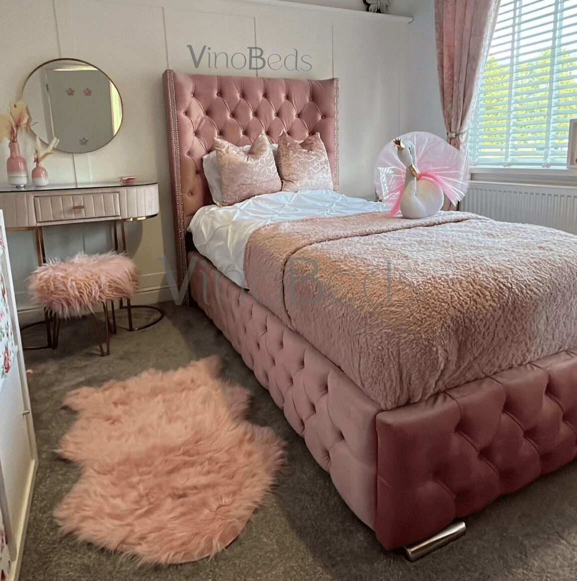 Front view of the Burby Bed in pink with plush tufted headboard, children's bed handcrafted in the UK